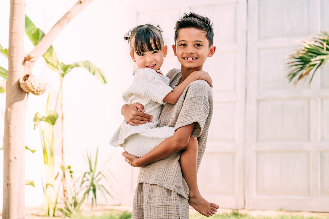 Matching children’s outfits made from soft bamboo fabric, styled for warm weather, highlighting breathable, playful and comfortable design for kids.