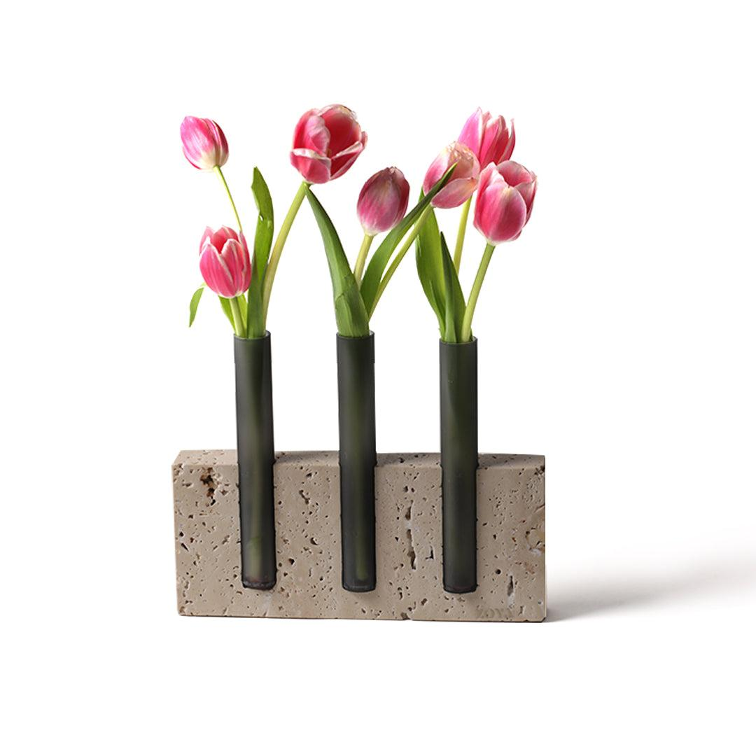 Marble base with glass tubes, used for displaying flowers